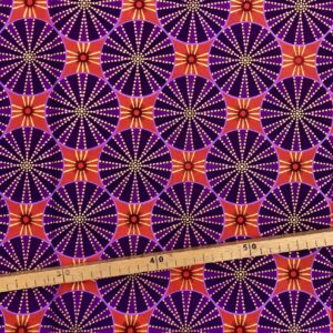 Tissu Wax pailleté violet orange imprimé Circus